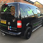 VW caddy van sign written showing social media links quality vehicles and equipment.